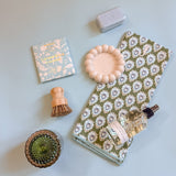 Welcome home gift box featuring calming self-care and elevated kitchen essentials