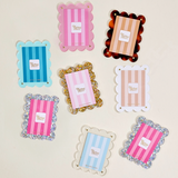 Mini blue acrylic photo frame magnet for displaying a favorite picture.