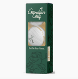 Gamblin' Golf single sleeve containing three golf balls in casino-themed packaging for golfers and gift giving.
