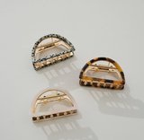 Small Adorro Rosalie half moon metal claw clip featuring a sleek, modern design for securing everyday hairstyles.