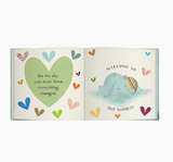 Sweet elephant-themed new baby book, perfect for celebrating arrivals and first milestones.