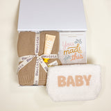 Confete Mommy + Me gift box with cozy blanket, devotional, lotion, and baby pouch arranged in a white keepsake box.