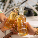 Elegant 250ml TÖST alcohol-free sparkling beverage with a sophisticated, lightly sparkling finish for any occasion.