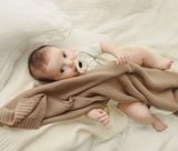 Bleu La La organic cotton baby blanket – the perfect newborn essential and thoughtful baby shower gift.