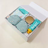 Luxury mini spa gift box with calming products for stress relief and comfort.