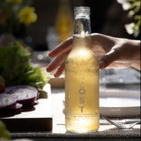 250ml bottle of TÖST non-alcoholic sparkling beverage, perfect for celebrations, gifting, and everyday toasts.
