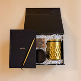 Espresso Martini gift box with gold tumbler, black notebook, and espresso martini chocolates
