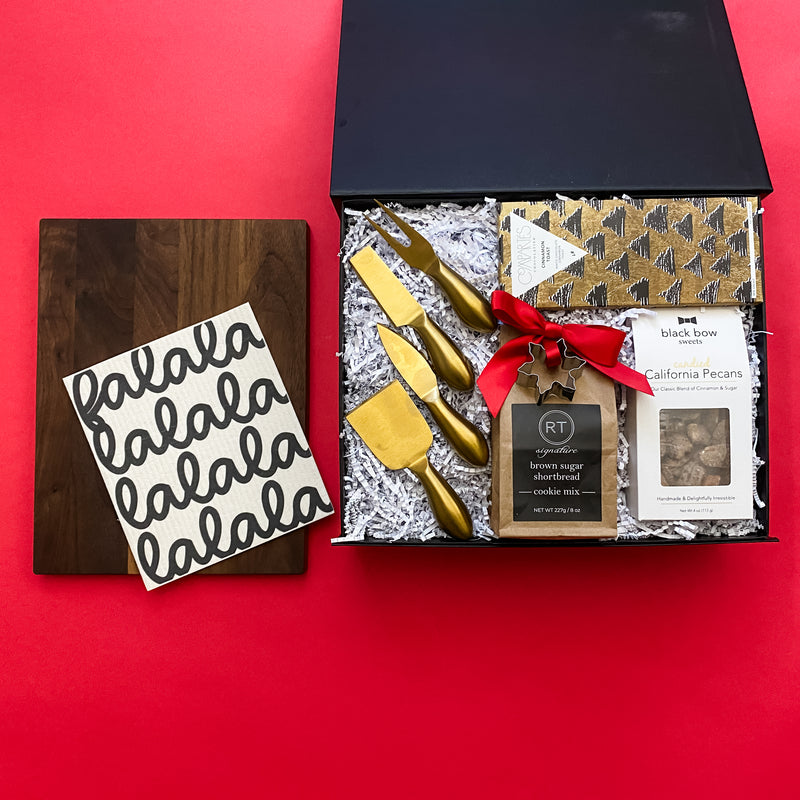 Holiday Gather Gift Box, Dish Towel, Charcuterie utensils, gold, shortbread cookie mix, candied pecans, walnut cutting board, Cinnamon Toast Crunch chocolate, Confete Party