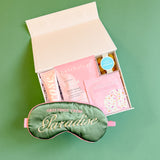 Out of office self-care gift box with satin eye mask and relaxing skincare products
