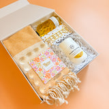 Realtor closing gift box featuring travel mug, Turkish towel, and cedar lemongrass room spray
