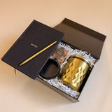 Luxury client appreciation gift box with black and gold elevated essentials

