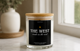 Elegant West Candle by Confete Gifts showcased on a tabletop, adding warmth and ambiance to any space.
