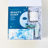 All is Calm Holiday Gift Box, blue gift box, patchology beauty sleep mask, calm lavender candle, compartres marshmallow crips chocolate bar, poppy pout sweet mint lip balm, heritage hand cream - white gardenia, Confete gifts and party boxes