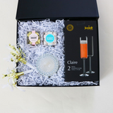 New Year's Eve 2023 Gift Box, JoyJolt Claire Champagne Flutes, Seattle Chocolate Champagne Truffles, Sugarfina Champagne Bubbles, Party Horns, Soi Petite Prosecco Candle, Confete gifts and part boxes 