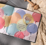 The World Waited for You baby book styled as a newborn gift.