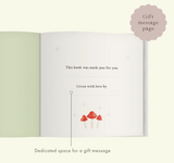 Hello Little One baby memory book styled as a baby shower gift.