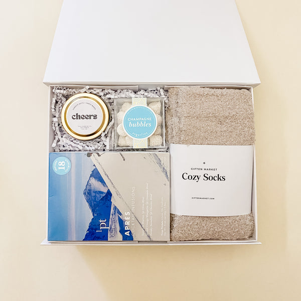 Apres Gift Box, self care, cozy socks, cheers, candle, sugarfina champagne bubbles, confete party