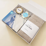 Apres Gift Box, self care, cozy socks, cheers, candle, sugarfina champagne bubbles, confete party