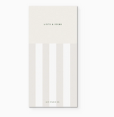 Modern striped cover notepad from Aim Studio Co. ideal for daily organization and note-taking.