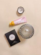 Luxury Valentine’s Day gift box XOXO including XO ring tray, rose shea butter lotion, merlot wine gummies, and heathered suede soy candle.