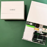 On the Green luxury golf gift box by Confete featuring premium golf accessories, gourmet snacks, and thoughtful gifts for golfers.