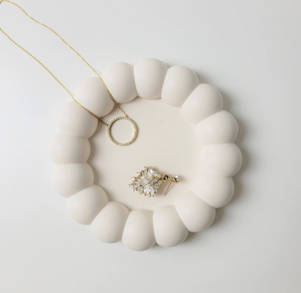 Handmade terrazzo jewelry tray with a playful bubble design, perfect for gifts and home décor.
