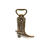 Gold cowboy boot bottle opener with western stitching detail on neutral background.