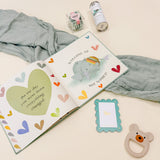 Close-up of Confete New Baby Gift Box showing Maeve Bon Bons and Botanical Birds pregnancy tea for the new mom.