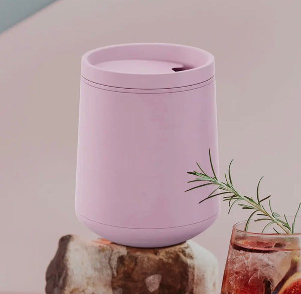 Soft matte pink portable wine tumbler with lid — stylish insulated drinkware for wine lovers.