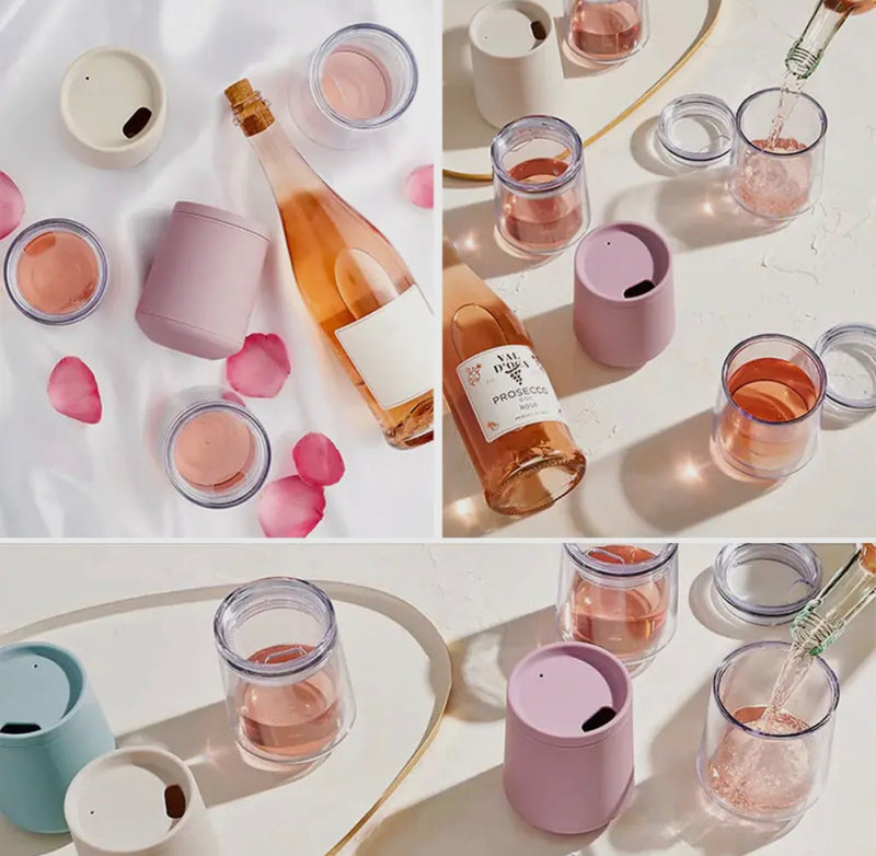 Two portable wine tumblers filled with red wine on a table — durable and elegant outdoor drinkware.