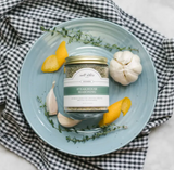 Salt Sisters Steakhouse Seasoning jar filled with a savory herb, spice, and salt blend for grilling and cooking.