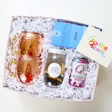 Summer Spritz Gift Box including two copper cow moscow mule mugs, JCOCO 85% dark chocolate bar, Mixy Skyline cocktail infusion kit, and Q Light ginger beer.